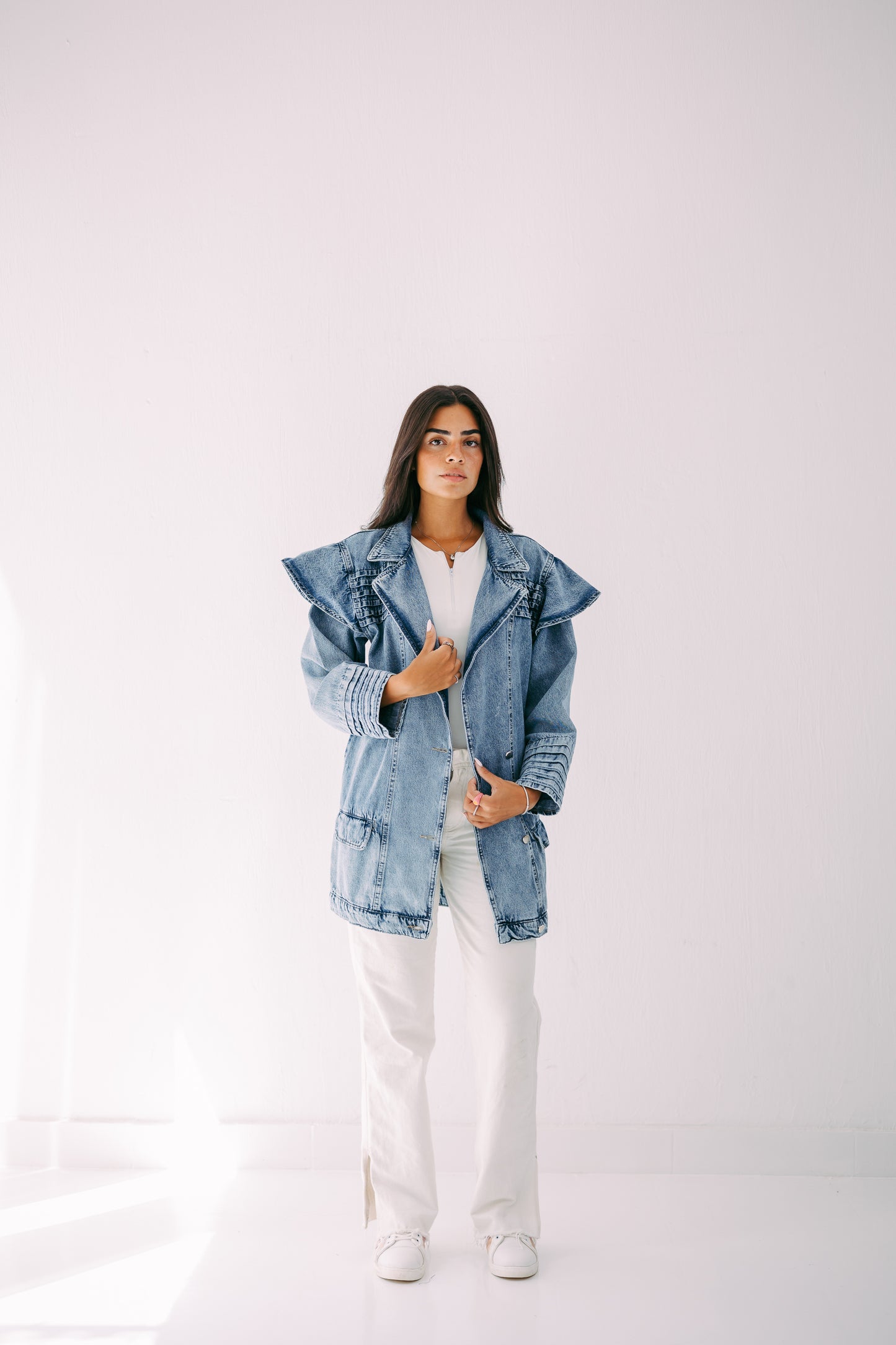 The ruffle denim in blue