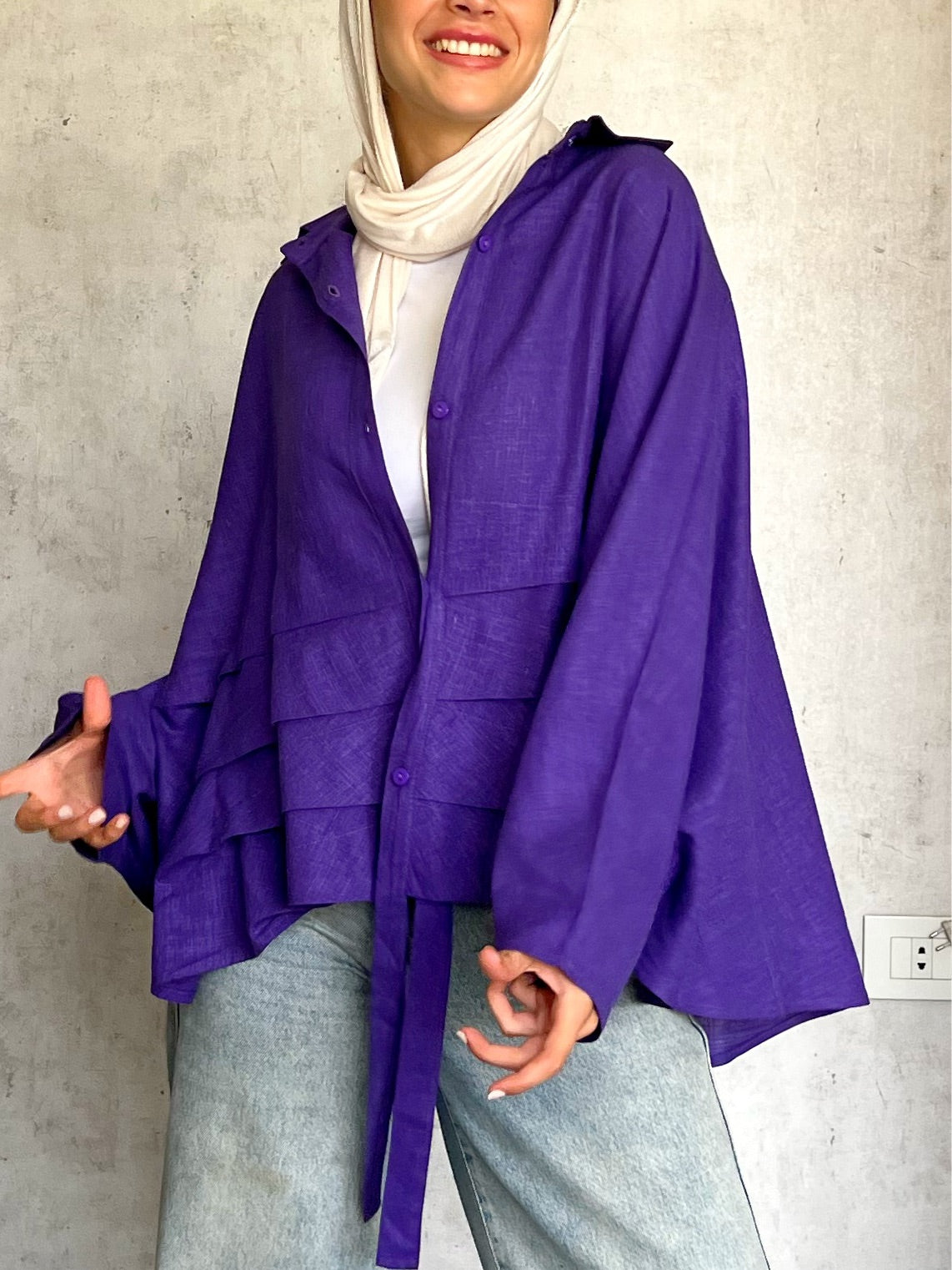 The ruffle linen chemise in purple.