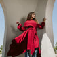 Asymmetrical dress in maroon