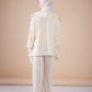 The asymmetrical set in offwhite