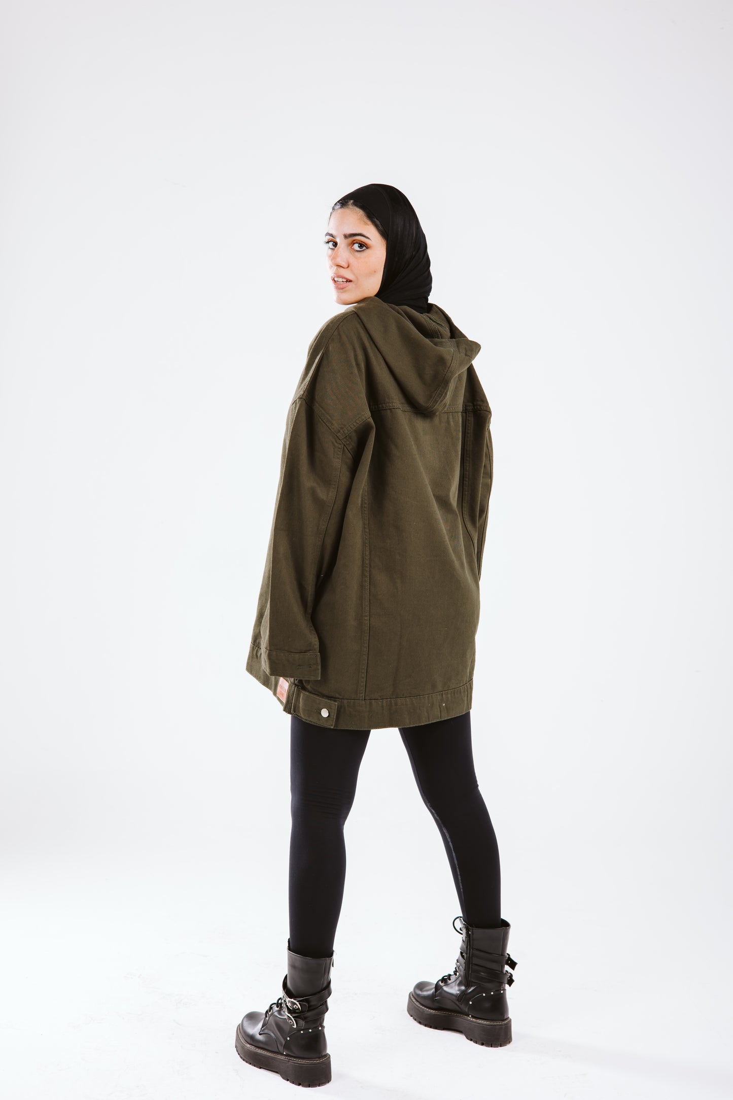 Girl in the hood in olive