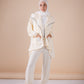 The asymmetrical set in offwhite