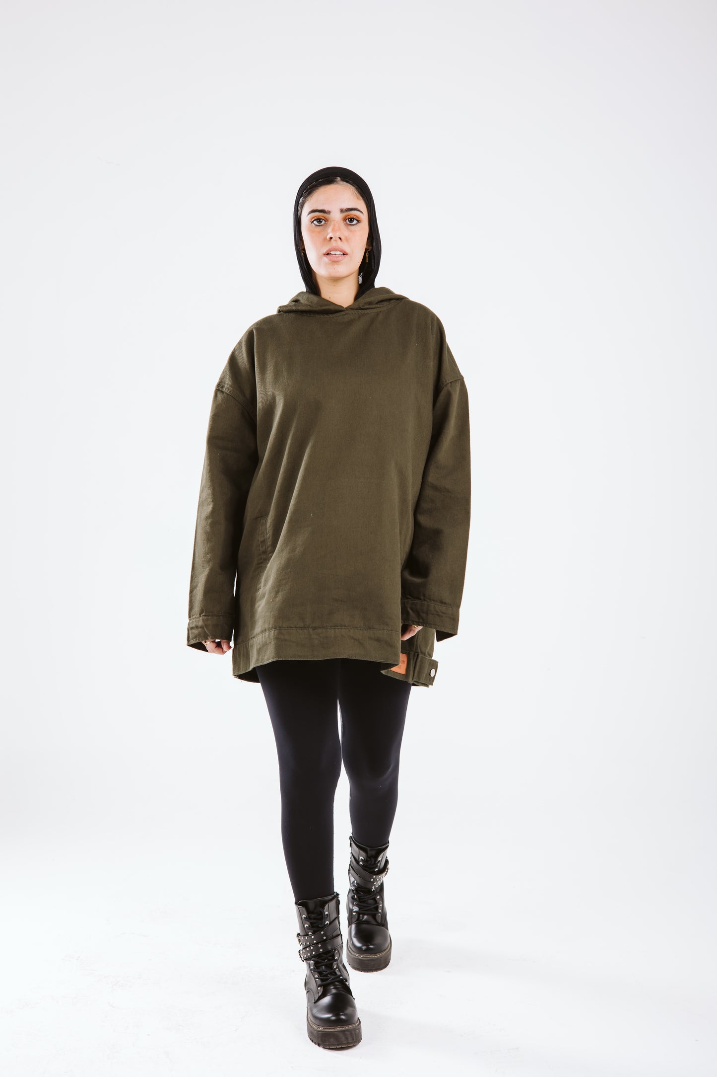 Girl in the hood in olive