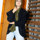 The furry jacket in black