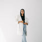 The ruffle denim in white