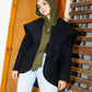 The furry jacket in black